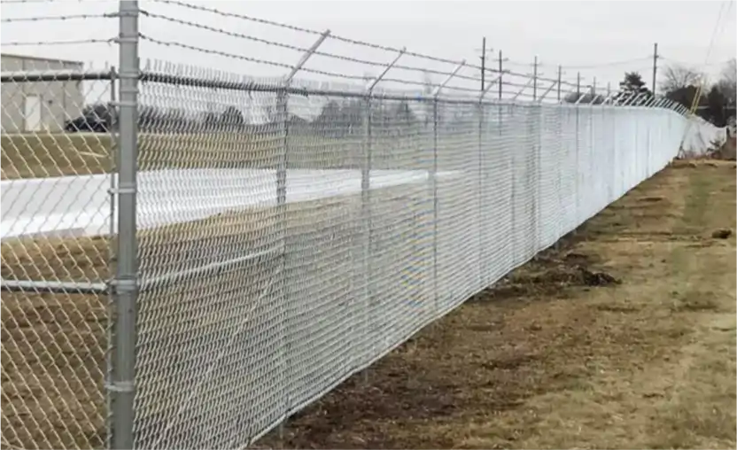 Chain link fence along grassy area